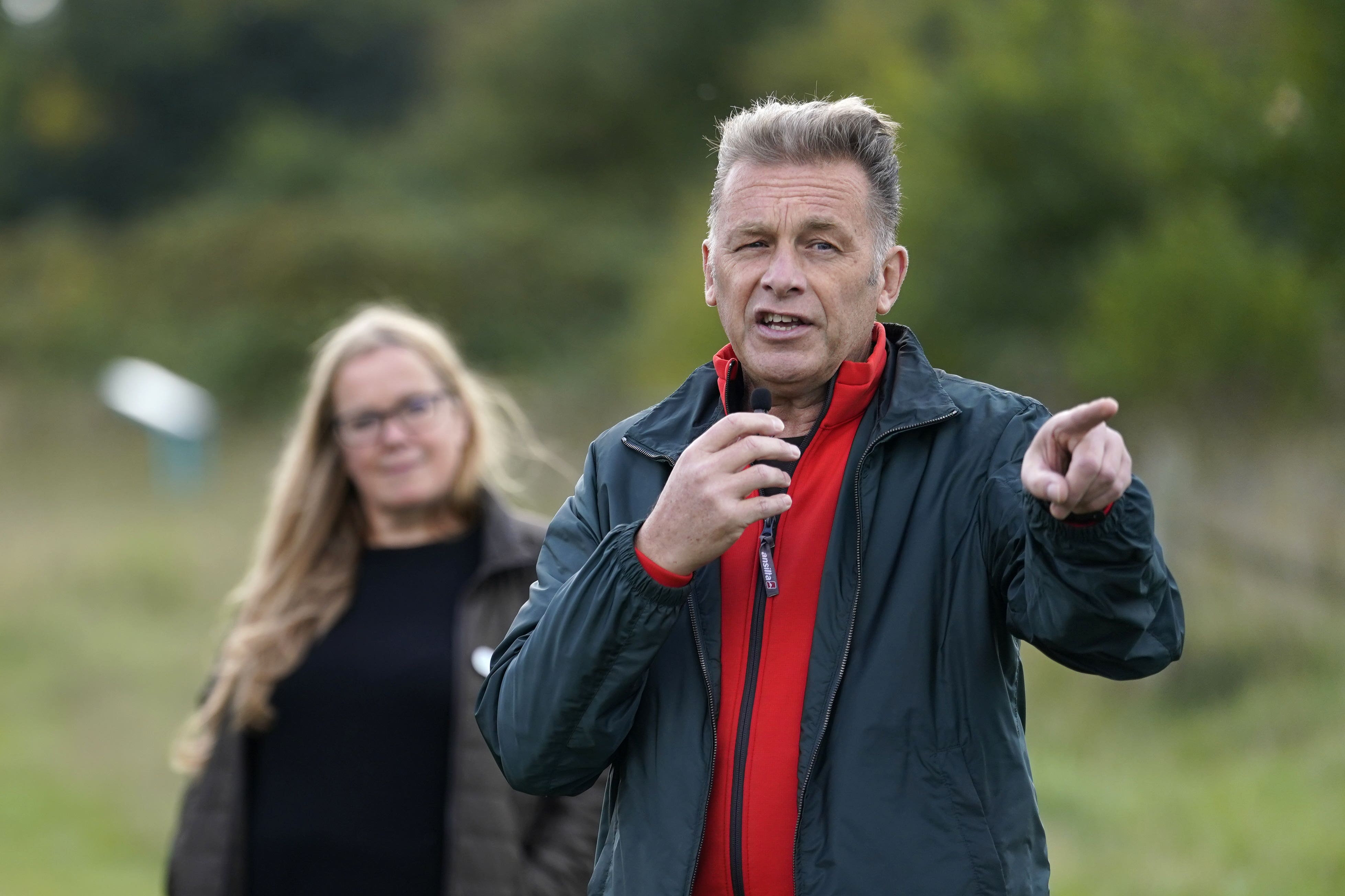 Conservationist Chris Packham gives a speech to wildlife supporters during a conversation about nature at Bassetts Mead country park, near Hook in Hampshire (Andrew Matthews/PA)