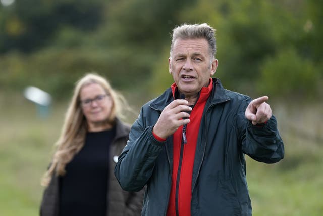 Conservationist Chris Packham gives a speech to wildlife supporters during a conversation about nature at Bassetts Mead country park, near Hook in Hampshire (Andrew Matthews/PA)