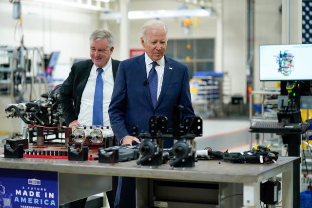 <p>President Joe Biden tours the Volvo Group Powertrain Operations in Hagerstown, Md., Friday, Oct. 7, 2022. (AP Photo/Manuel Balce Ceneta)</p>