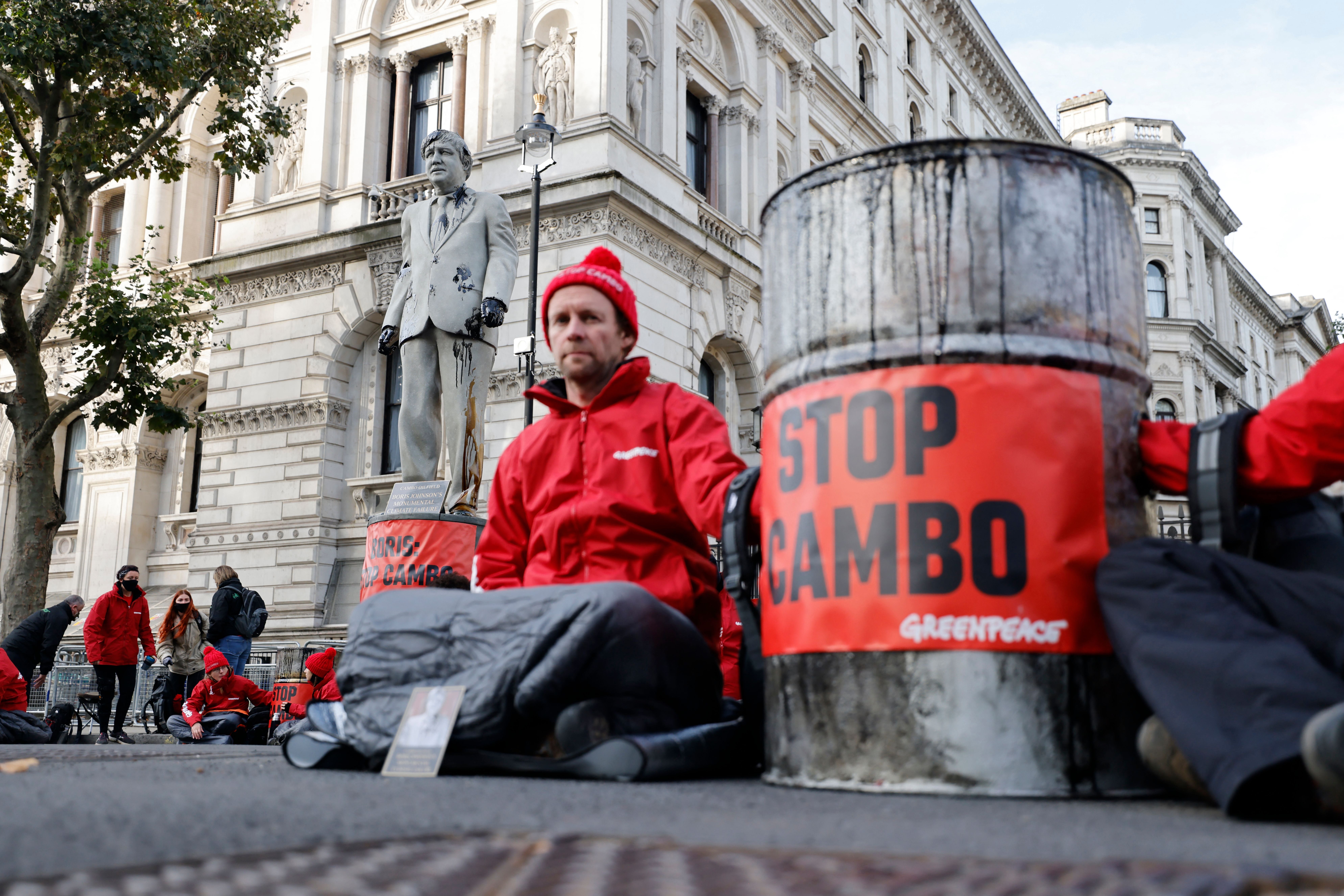 Greenpeace activists stage a Downing Street sit-in to protest against the Cambo oil field project in the Shetland Islands