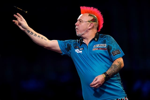 Peter Wright is in to the semi-final of the World Grad Prix in Leicester (John Walton/PA)