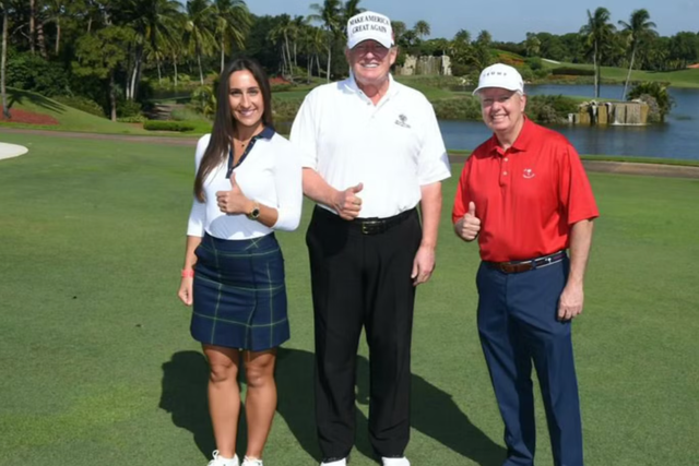 <p>A woman going by the name ‘Anna de Rothschild’ — allegedly an alias used by Ukrainian-born Inna Yashchyshyn — posing with former President Donald Trump and Senator Lindsey Graham at Mar-a-Lago</p>