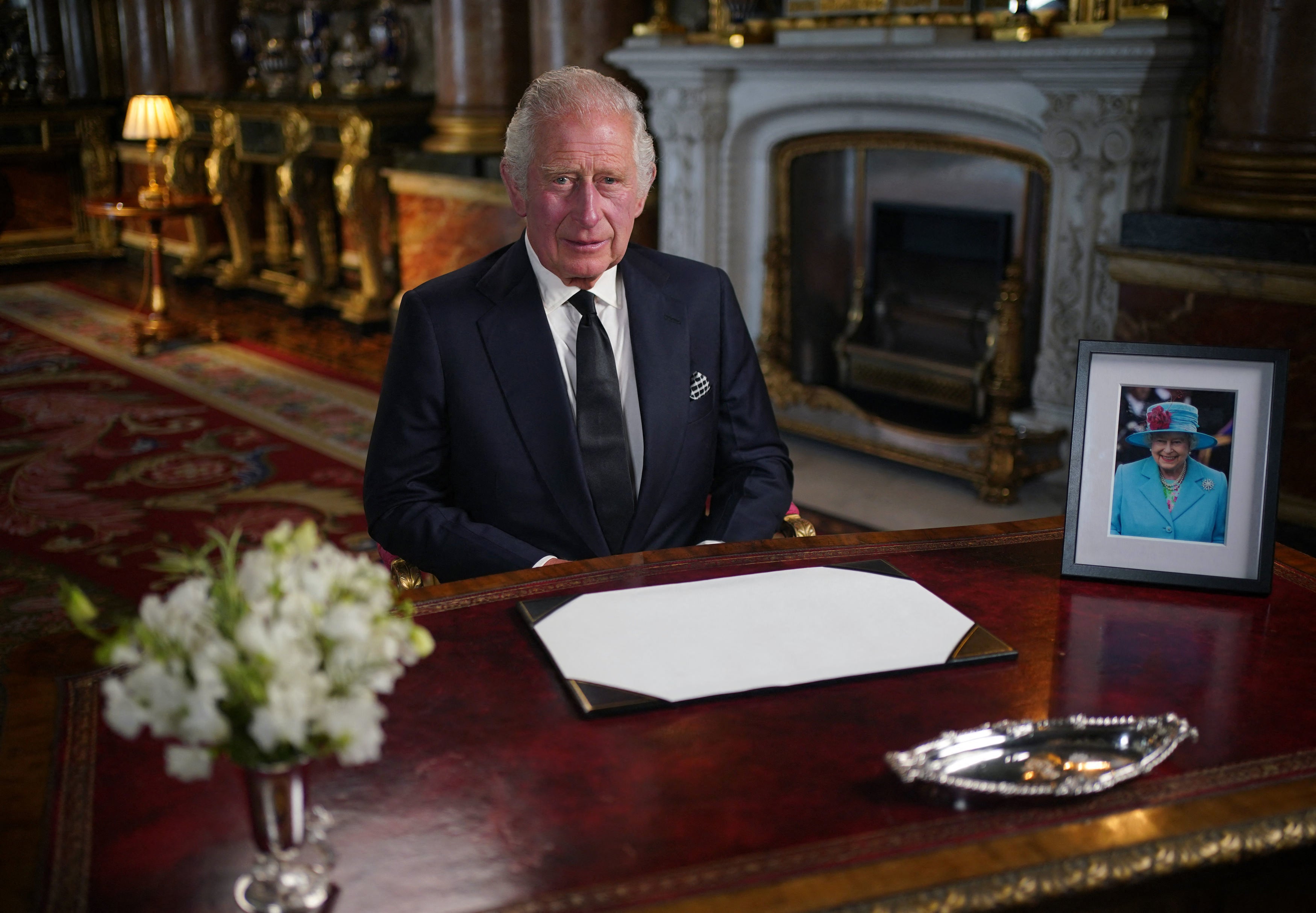 King Charles III makes a televised address to the Nation and the Commonwealth from the Blue Drawing Room at Buckingham Palace in London on September 9, 2022, a day after Queen Elizabeth II died at the age of 96