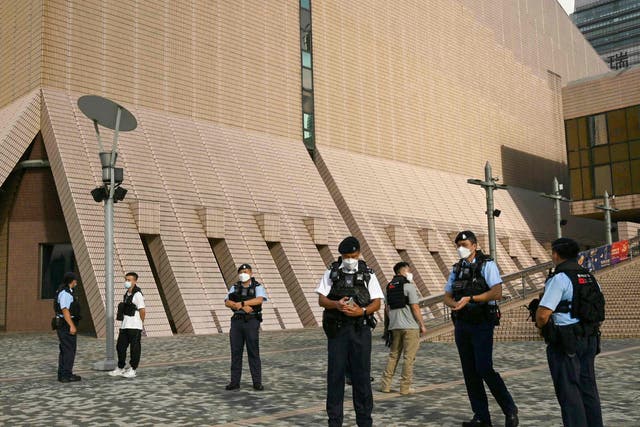 <p>Police keep watch in Hong Kong during commemorations for China’s National Day </p>