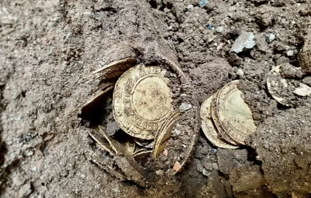 Couple sell coins found hidden under kitchen floor for a small fortune