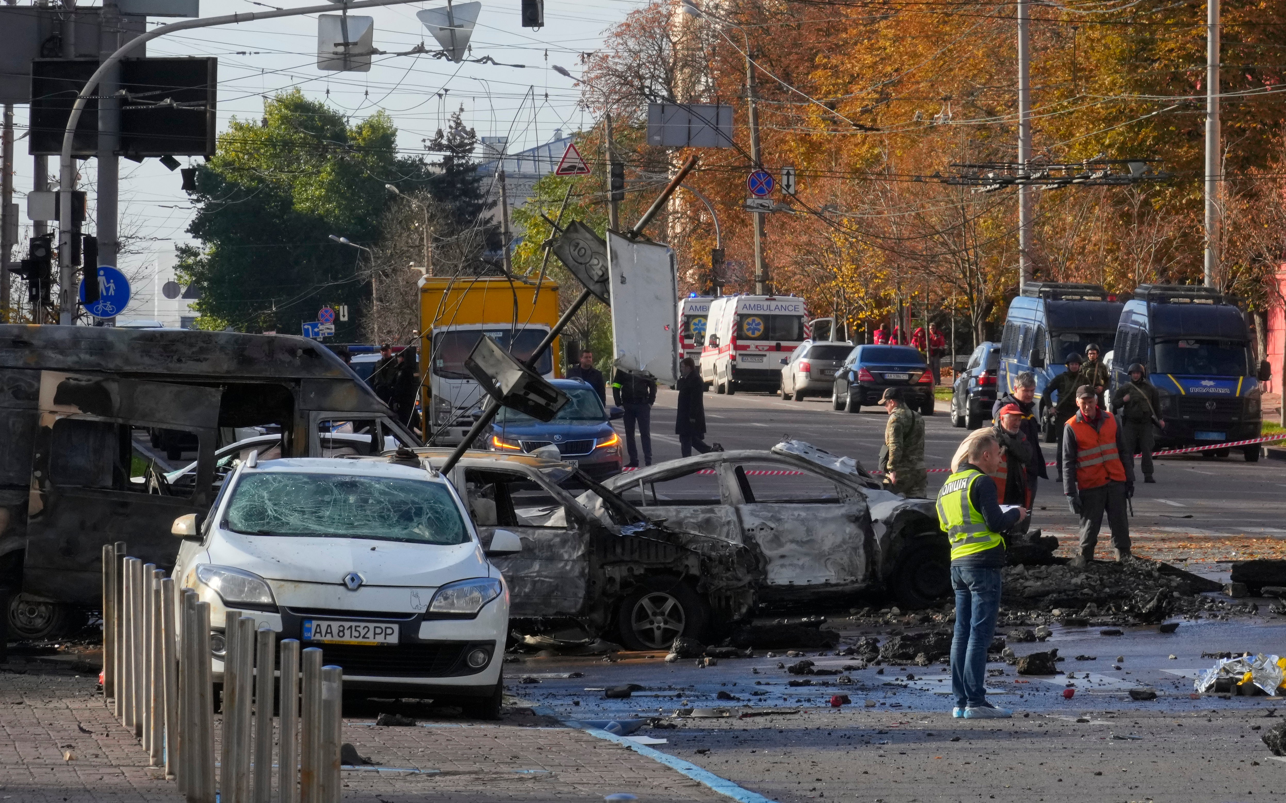 Police inspect the scene of Russian shelling in Kyiv, Ukraine
