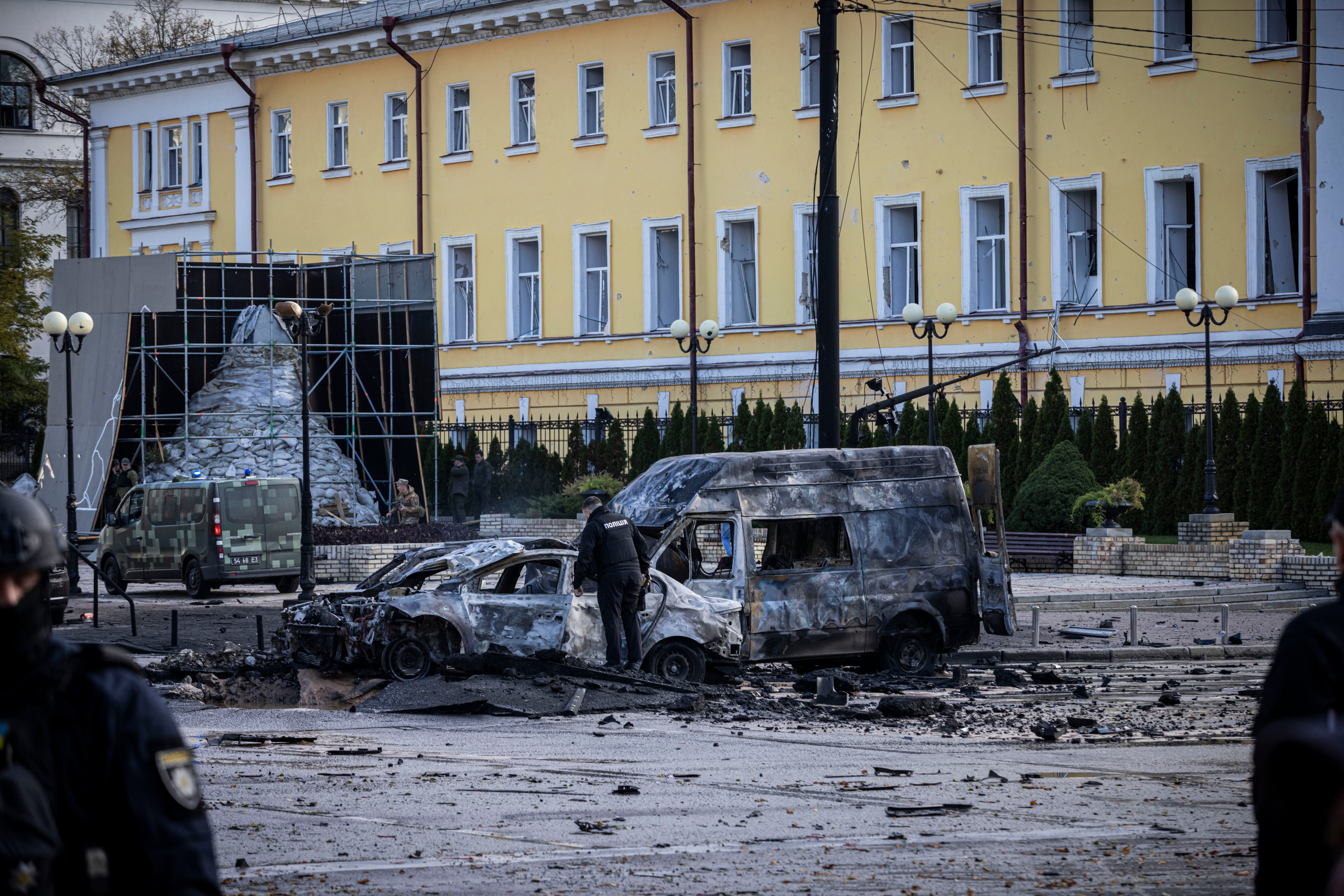 Emergency service personnel attend to the site of a blast