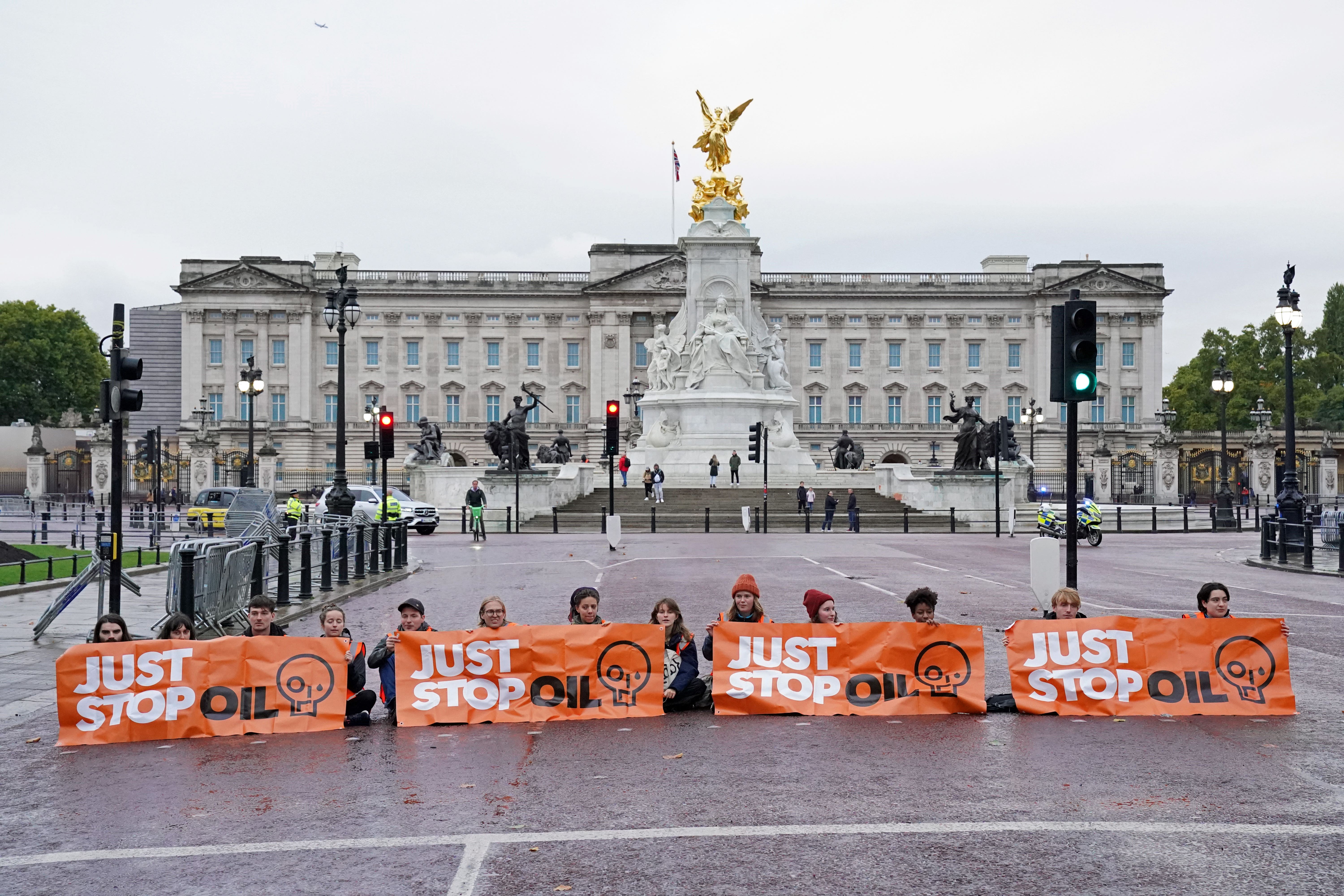Campaigners from Just Stop Oil block The Mall near Buckingham Palace