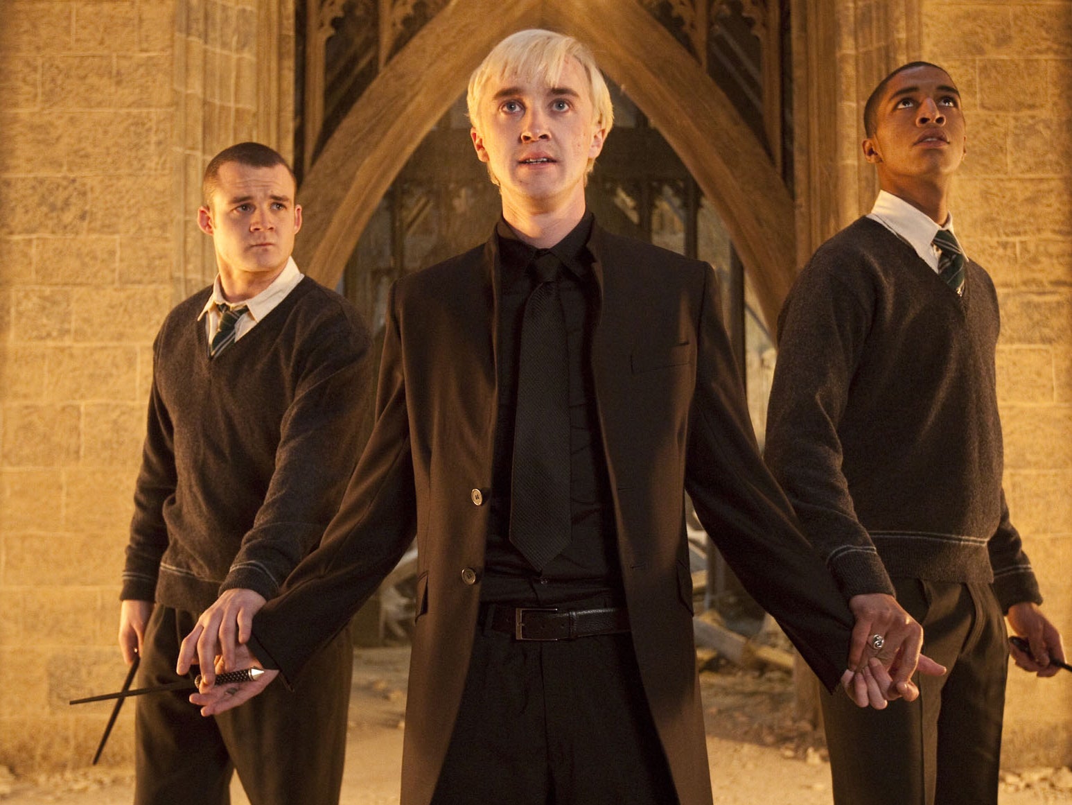 Felton (centre) as Draco Malfoy in ‘Deathy Hallows: Part 1’, alongside Josh Herdman and Louis Cordice