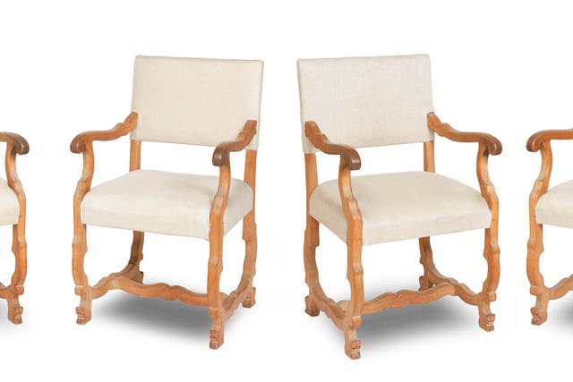 A set of four limed oak Tuscan open armchairs styled after Sir Robert Lorimer (Bonhams/PA)