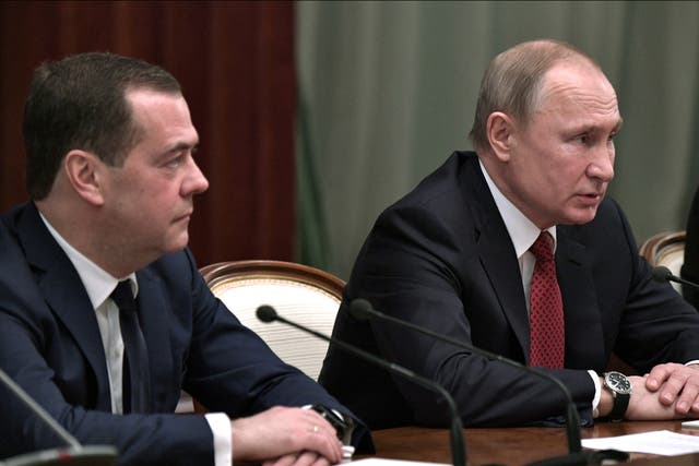 <p>Vladimir Putin and Dmitry Medvedev pictured at a meeting in Moscow in 2020</p>