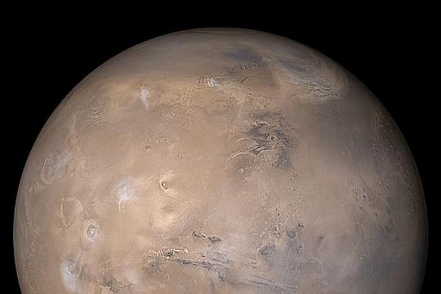 <p>Mars as seen by Nasa’s Mars Global Surveyor spacecraft</p>