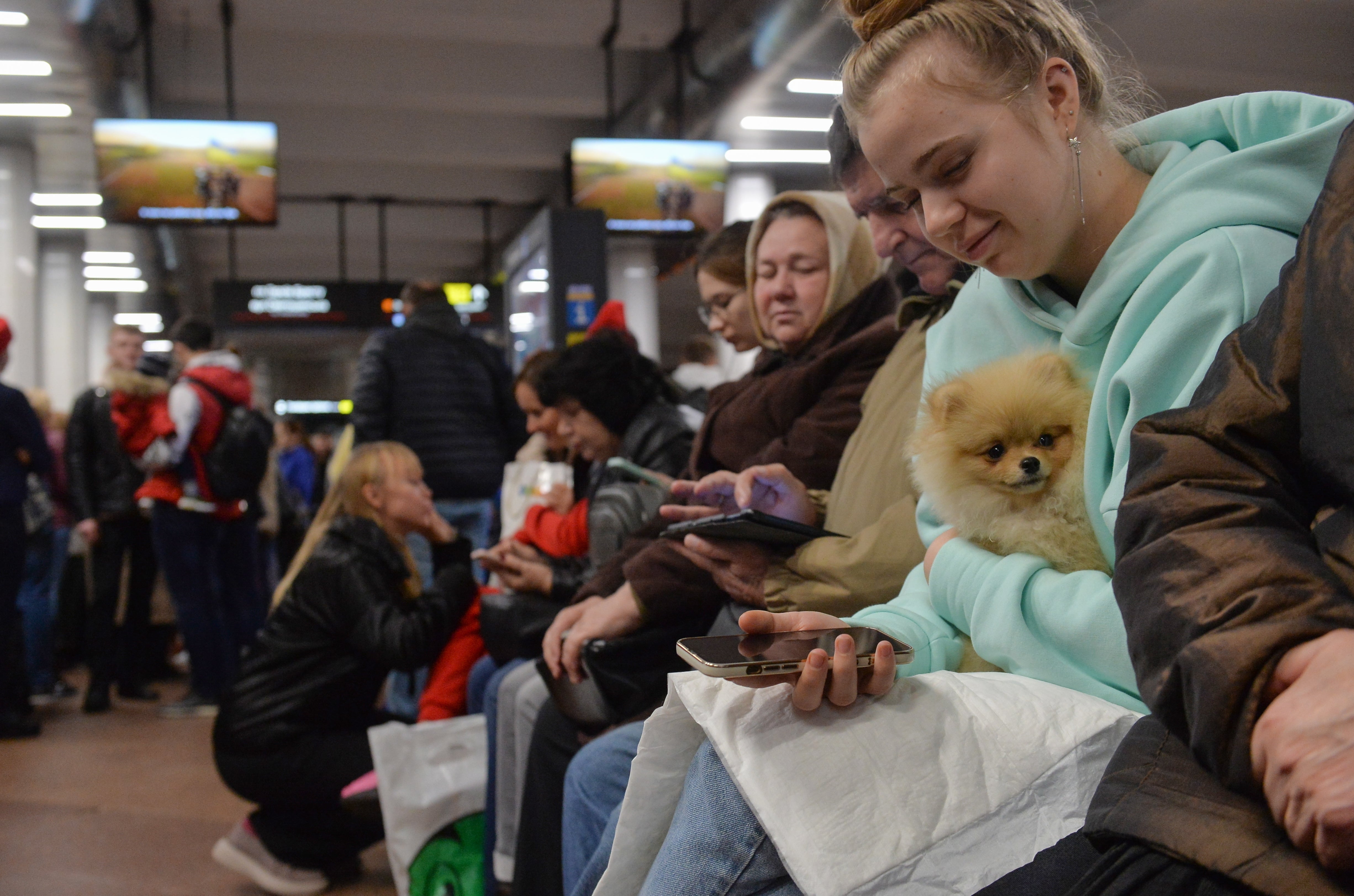 Ukrainians shelter from strikes inside a metro station in Kyiv