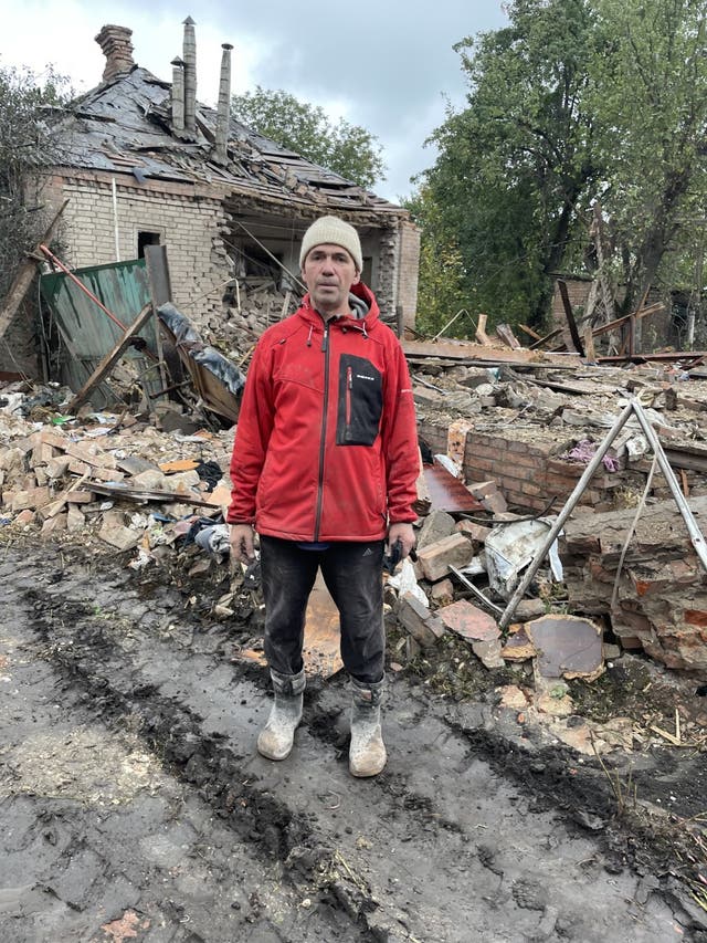 <p>Vladimir Chumak outside the rubble of his house in Slovyansk after a Russian missile attack in which his sister-in-law Zoya was killed</p>