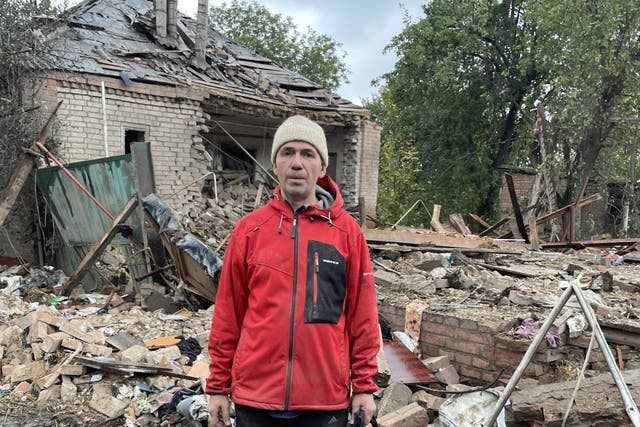 <p>Vladimir Chumak outside the rubble of his house in Slovyansk after a Russian missile attack in which his sister-in-law Zoya was killed</p>