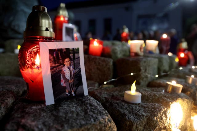A picture of five-year-old Shauna Flanagan Garwe at a vigil at Market Square, Letterkenny (Liam McBurney/PA)