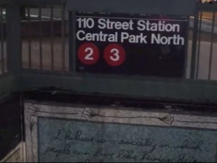 A woman was hit in the head by an unknown person while she was waiting at the Central Park North subway station early Monday, authorities say