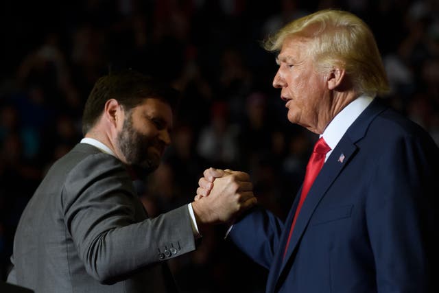 <p>JD Vance and Donald Trump at a campaign rally </p>