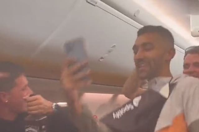 <p>The influencers shouted and filmed themselves on the Ibiza flight</p>