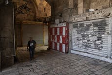 Palestinians strike in east Jerusalem over police raids