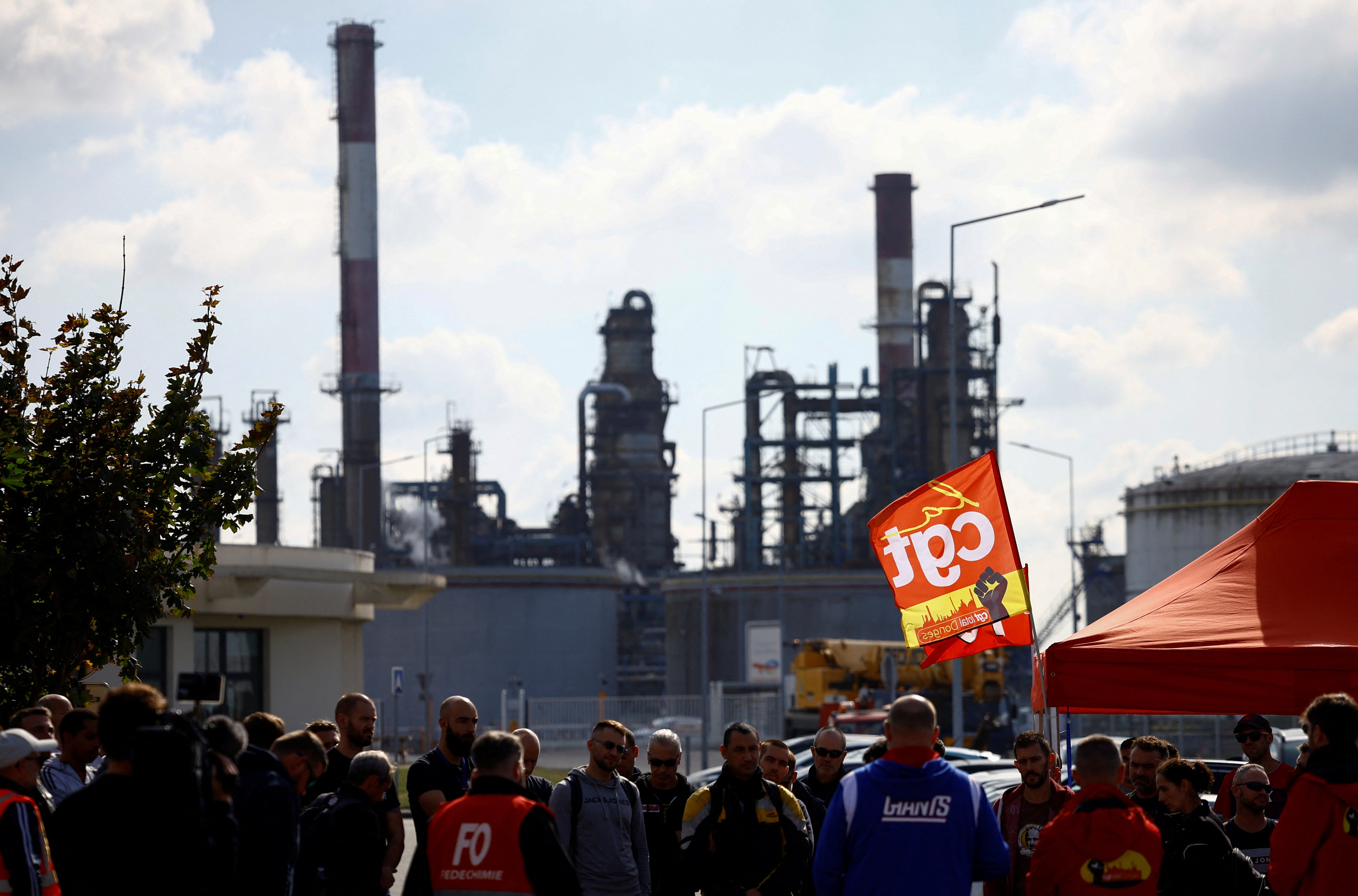 CGT members strike outside the TotalEnergies refinery near Saint-Nazaire in northern France
