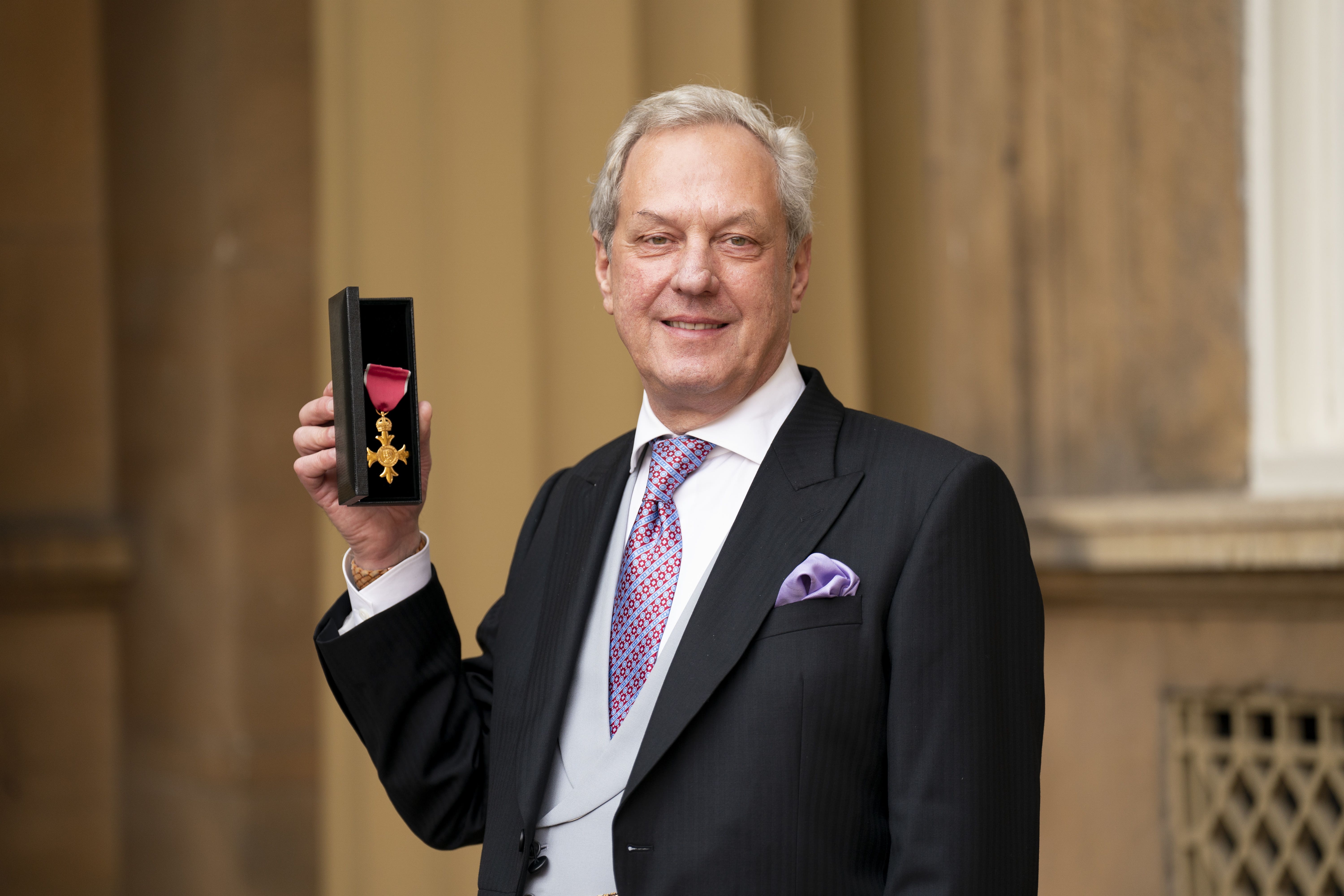 Charles Sabine with his OBE, awarded by the Princess Royal during an investiture ceremony at Buckingham Palace (Kirsty O’Connor/PA)