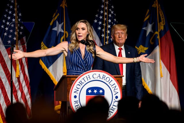 <p>Lara Trump speaks at an event hosted by the North Carolina GOP alongside her father</p>