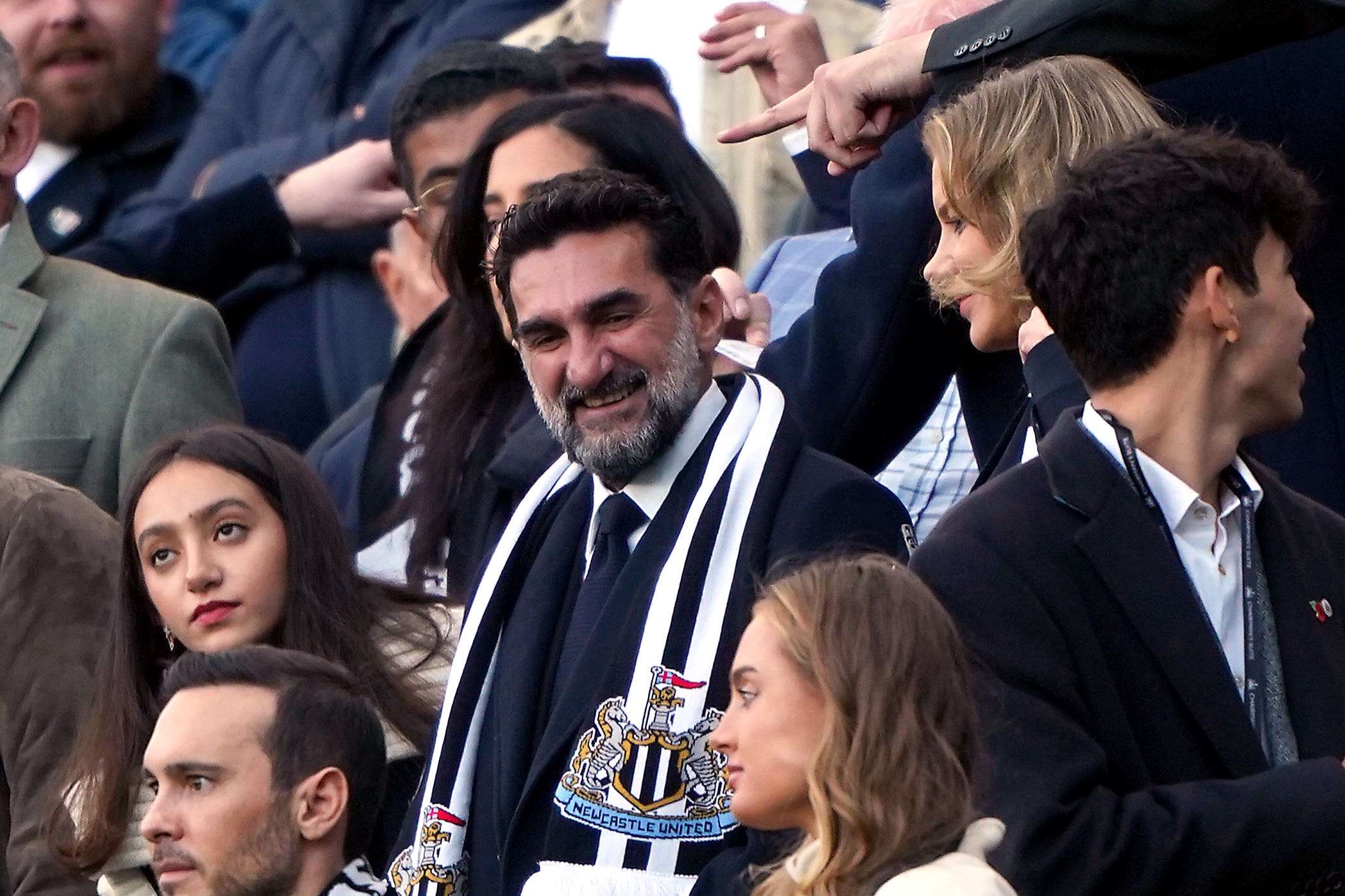 Newcastle chairman Yasir Al-Rumayyan (centre) is governor of Saudi Arabia’s Public Investment Fund (Owen Humphreys/PA)