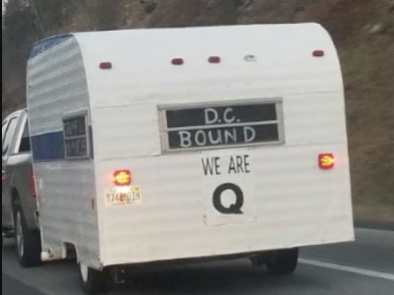 The Munn family camper adorned with the proclamation ‘DC Bound We Are Q'