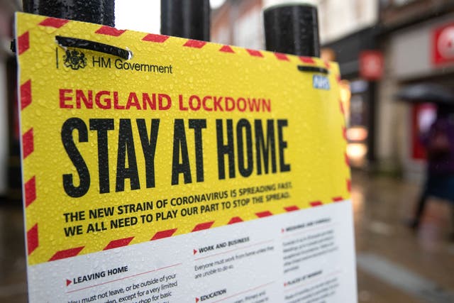 Government sign warning people to stay at home, during England’s third national lockdown to curb the spread of coronavirus (Andrew Matthews/AP)