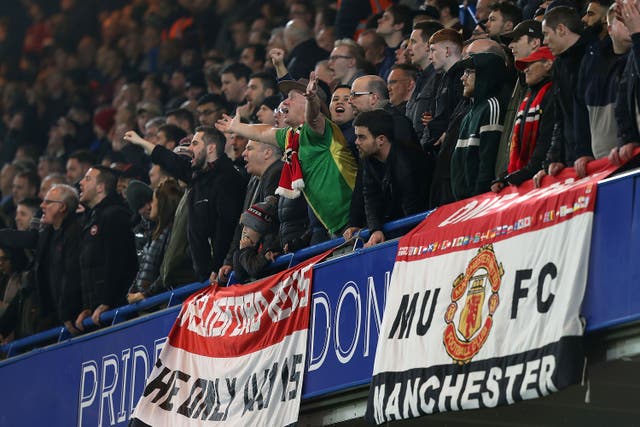 <p>Manchester United fans at Chelsea’s Stamford Bridge in 2019</p>