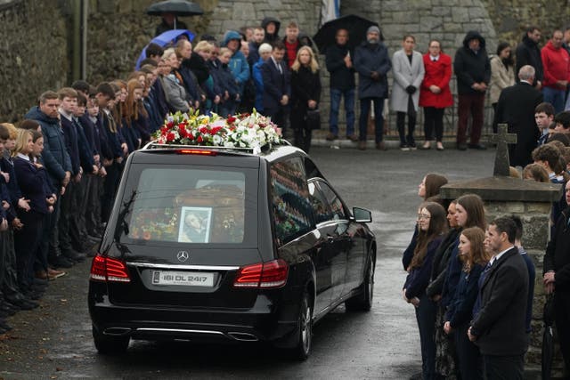 The hearse carrying the coffin of 14-year-old Leona Harper, who died following an explosion at the Applegreen service station in the village of Creeslough in Co Donegal on Friday, arrives at St Mary’s Church in Ramelton, Co Donegal, for her the funeral mass (Brian Lawless/PA)