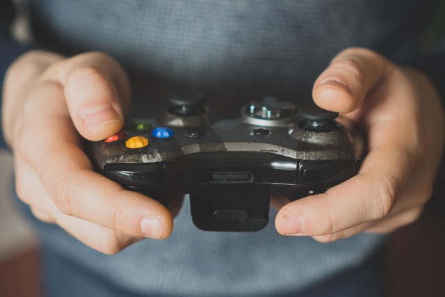 The Government has been urged to take action on in-game purchases to safeguard youngsters against harm (Alamy/PA)