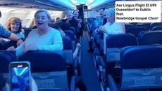 Gospel choir surprises plane passengers by singing onboard flight