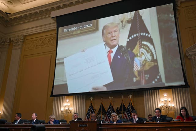 <p>A video is shown of former US President Donald Trump at the US House Select Committee hearing to Investigate the January 6 Attack on the US Capitol, on Capitol Hill in Washington, DC, on October 13, 2022</p>