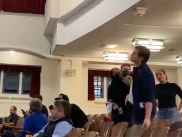 <p>One of the protesters at AOC’s town hall on Wednesday </p>