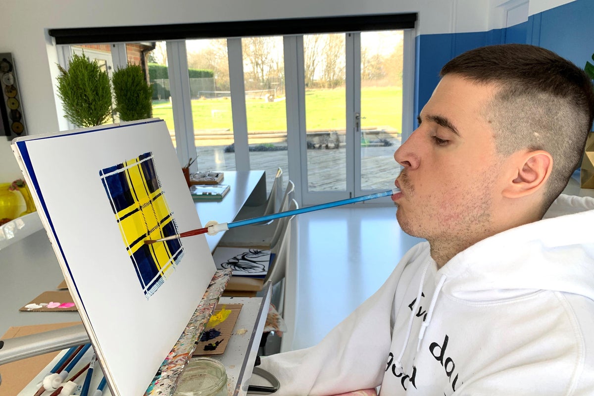 Artist who paints with his mouth unveils artwork inspired by ‘hero’ Doddie Weir