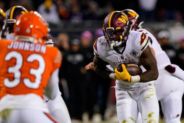 The Washington Commanders ended their four-game losing streak with a dour 12-7 victory over the Chicago Bears on Thursday night (Nam Y Huh/AP)