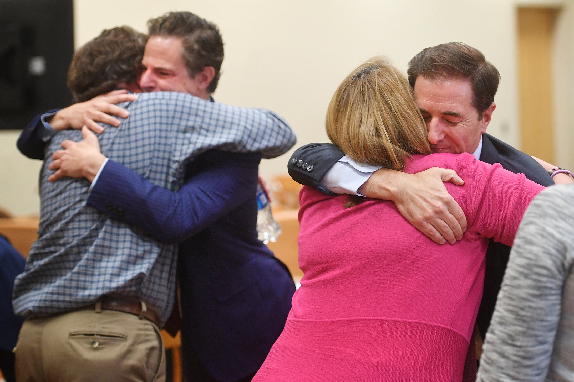 Sandy Hook families embrace as the jury delivers its verdict on compenstory damages