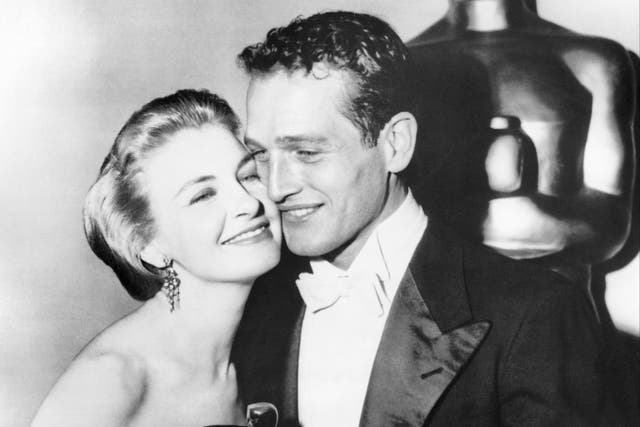 <p>Joanne Woodward poses on March 27, 1958 with her husband, actor Paul Newman, after winning the Academy Award for Best Actress in Hollywood</p>