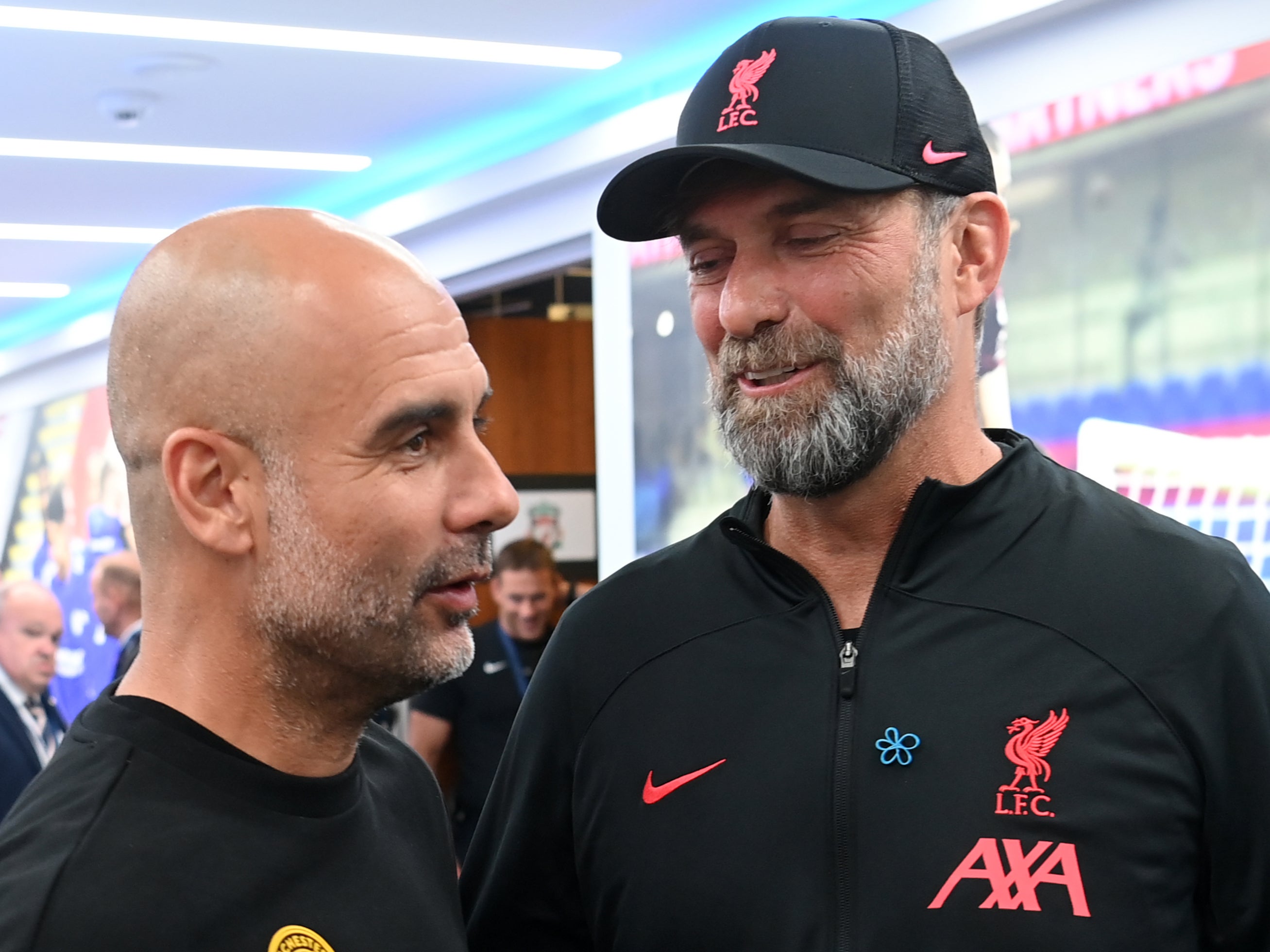 Manchester City manager Pep Guardiola with Liverpool counterpart Jurgen Klopp
