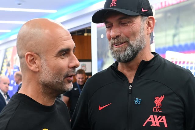 <p>Manchester City manager Pep Guardiola with Liverpool counterpart Jurgen Klopp</p>