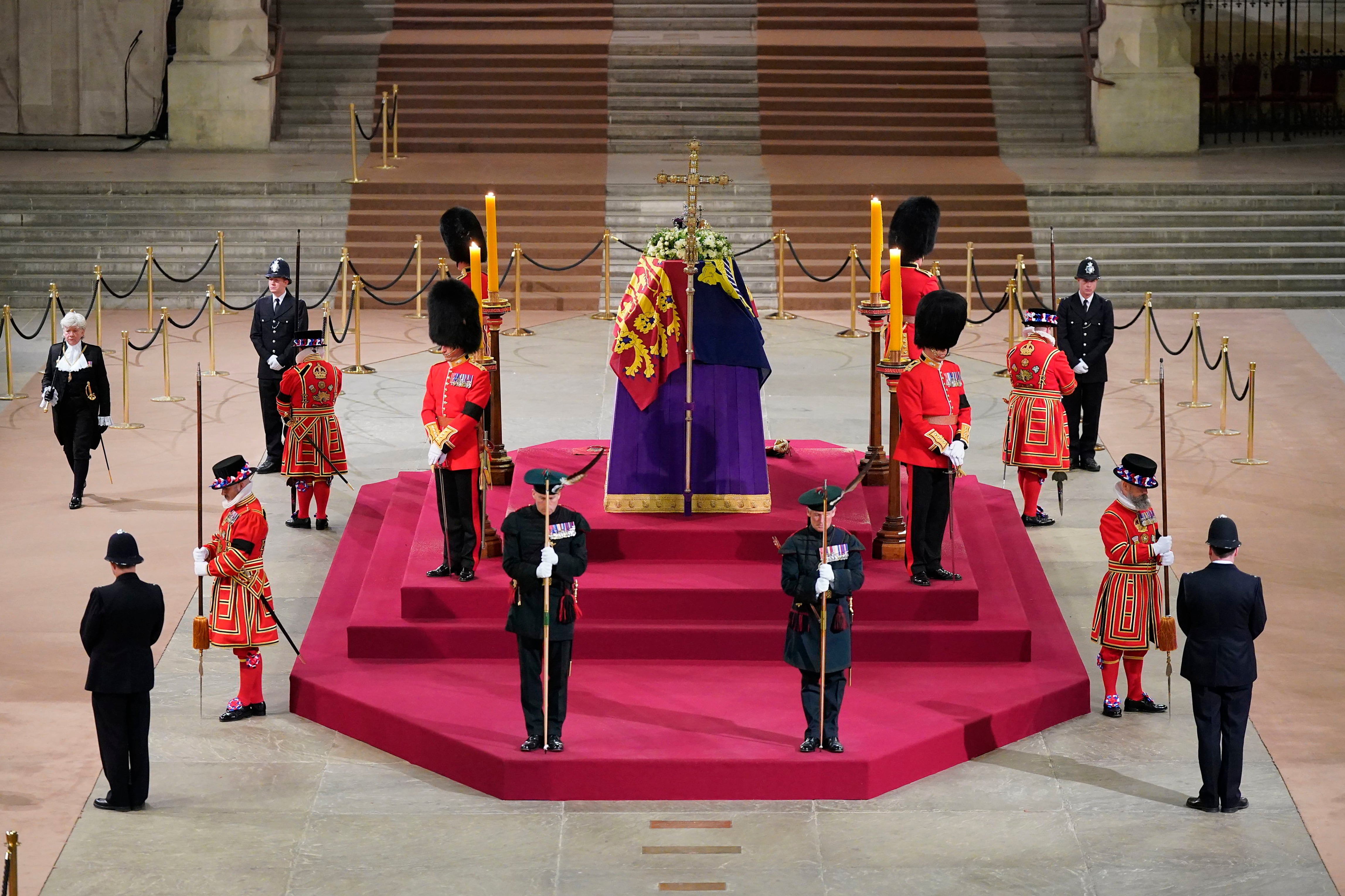 Black Rod walks through Westminster Hall at 06:29am to pay respect on the final day of the lying in state at the coffin of Queen Elizabeth II