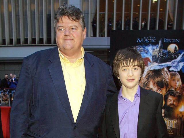 <p>Robbie Coltrane and Daniel Radcliffe at the premiere of ‘Harry Potter and the Sorcerer’s Stone’ in 2001</p>