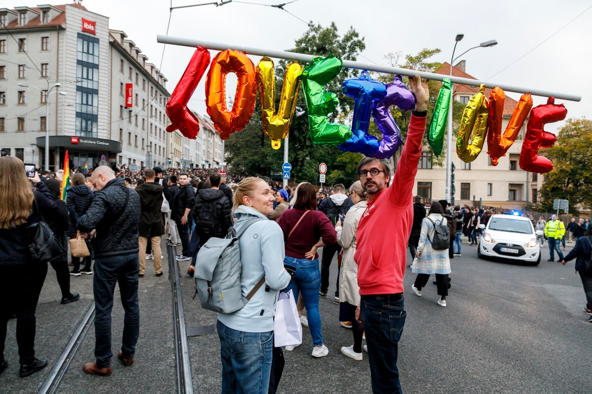 Thousands rally in Bratislava to honor 2 gay men shot dead