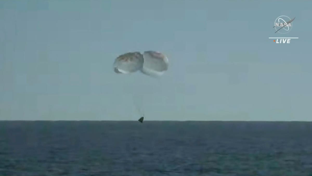 SpaceX ferries astronauts back to Earth after half-year away