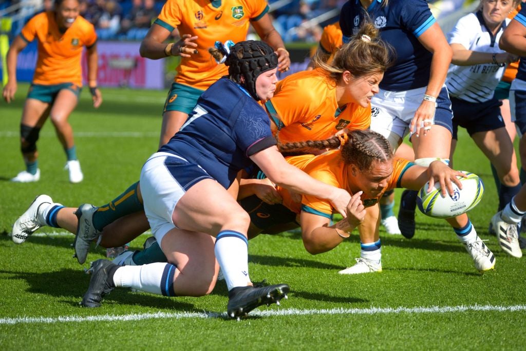 Australia’s Ashley Marsters scores her side’s second try during the Pool A win over Scotland on Saturday