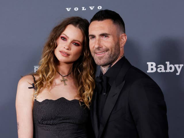 <p>Behati Prinsloo and Adam Levine</p>