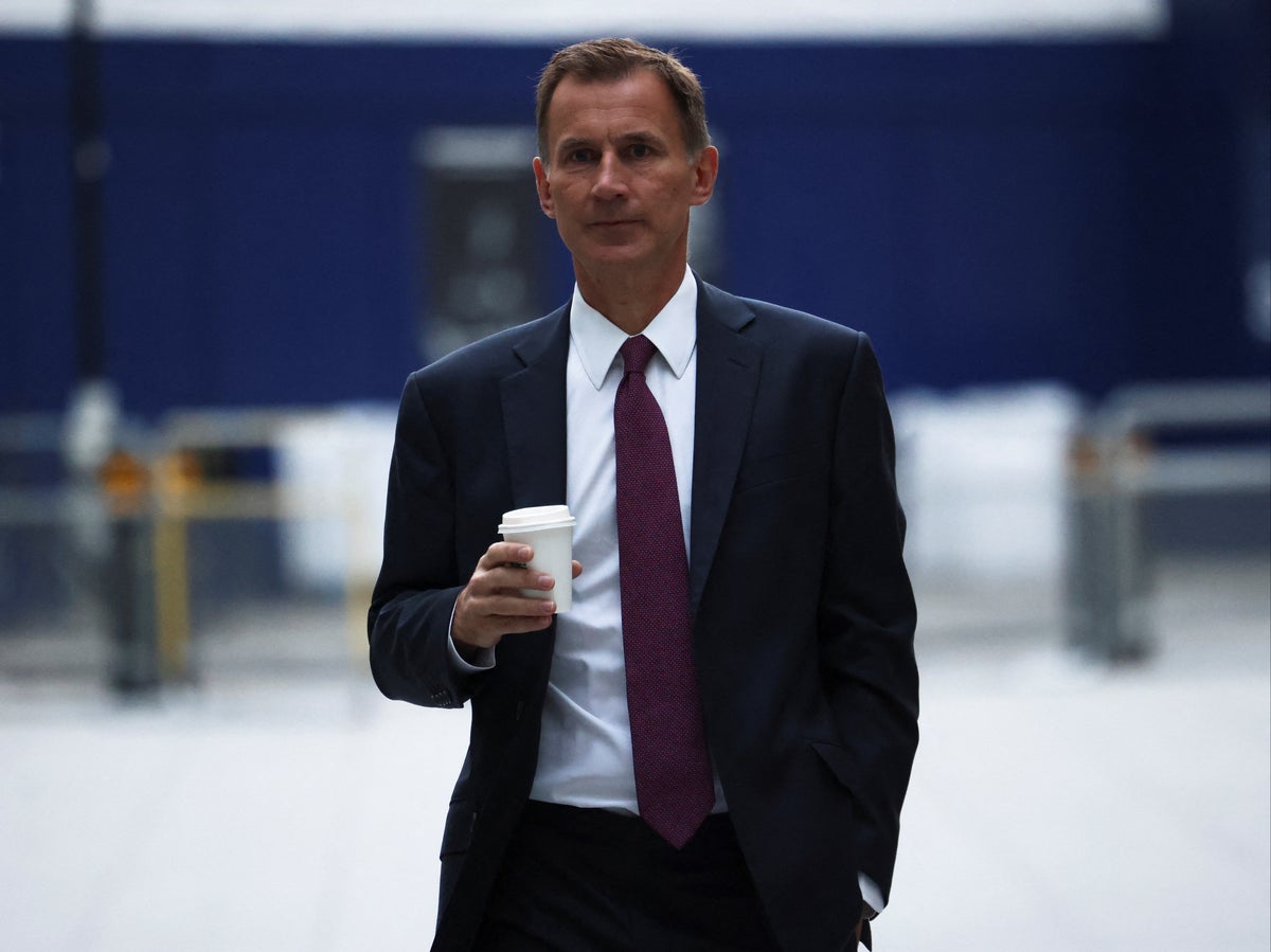 Jeremy Hunt says ‘difficult’ cuts needed and hints taxes will rise after mini-Budget ‘mistakes’