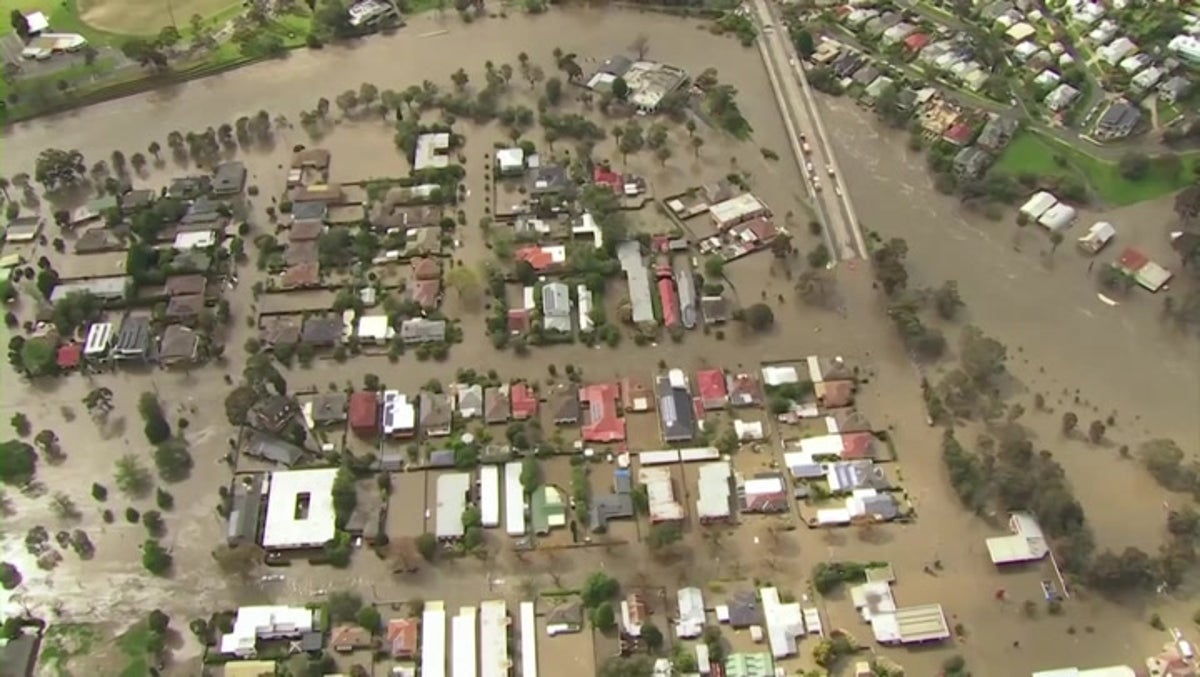 Houses surrounded by water as floods inundate Australia